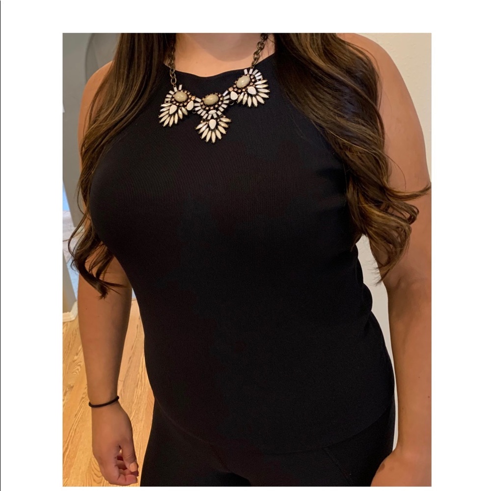 Black sleeveless blouse